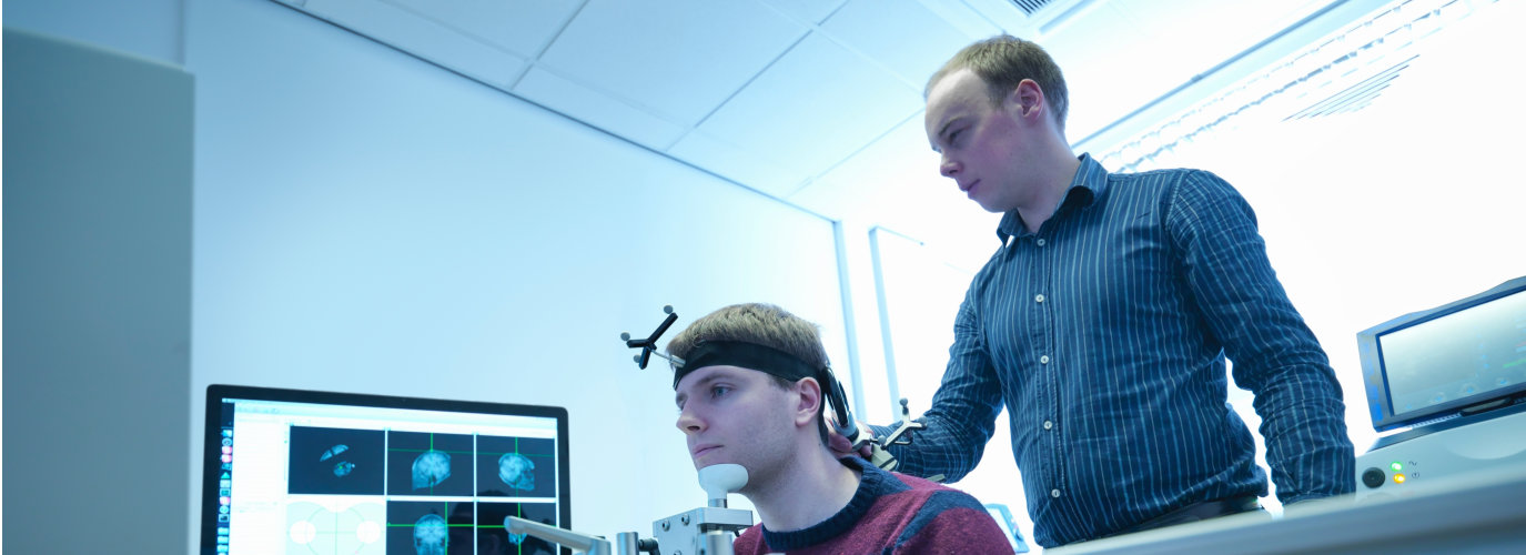 A man conducting test to the patient